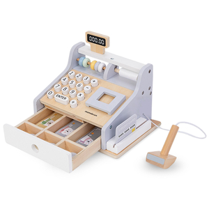 Puinen kassakone lisävarusteineen