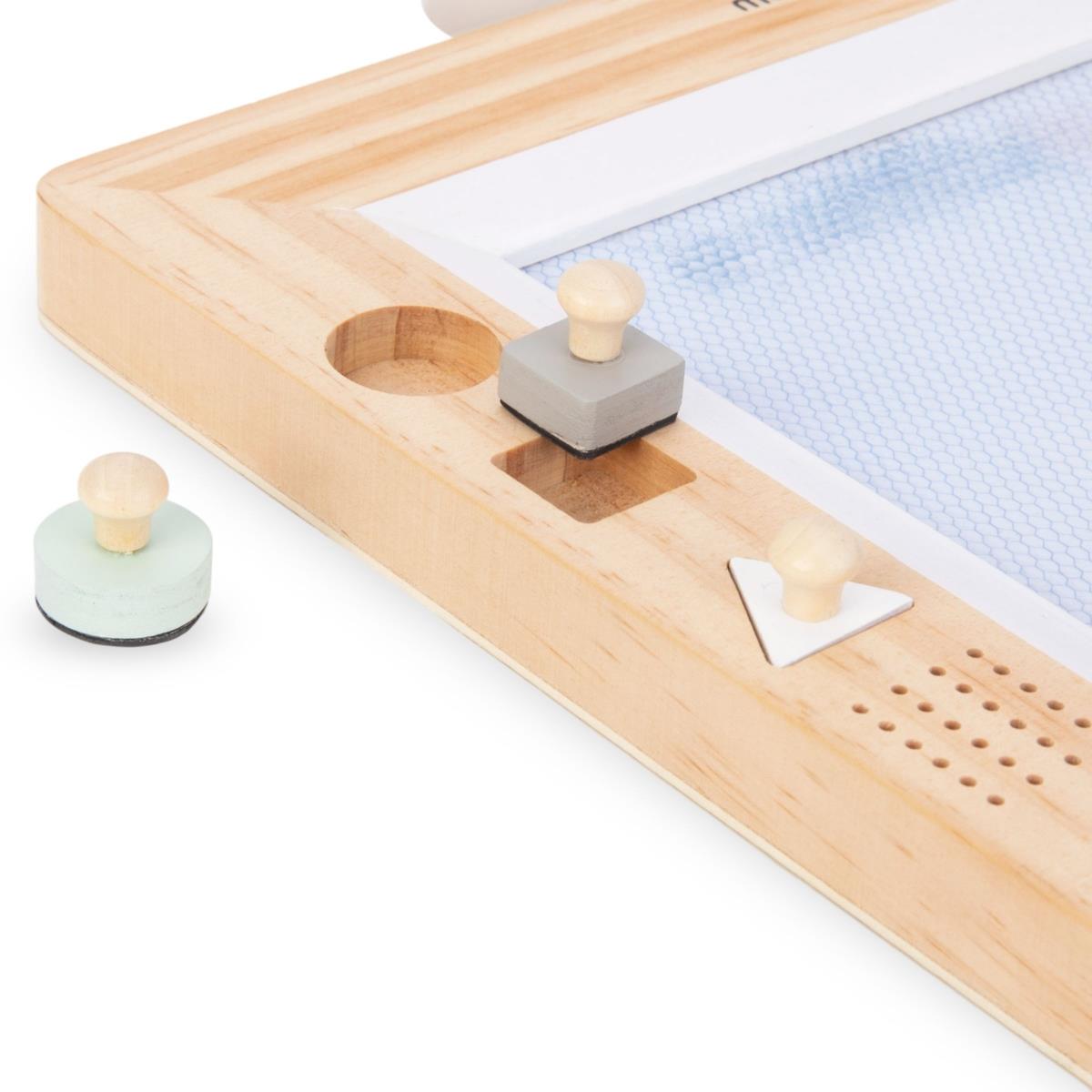 Puinen leikekirja, jossa leimat - piirustuslauta