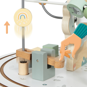 Puinen pyöreä opetuspöytä magneettijunalla ja helmenheittimellä